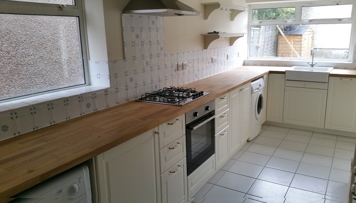 Cream shaker kitchen with solid wood worktop